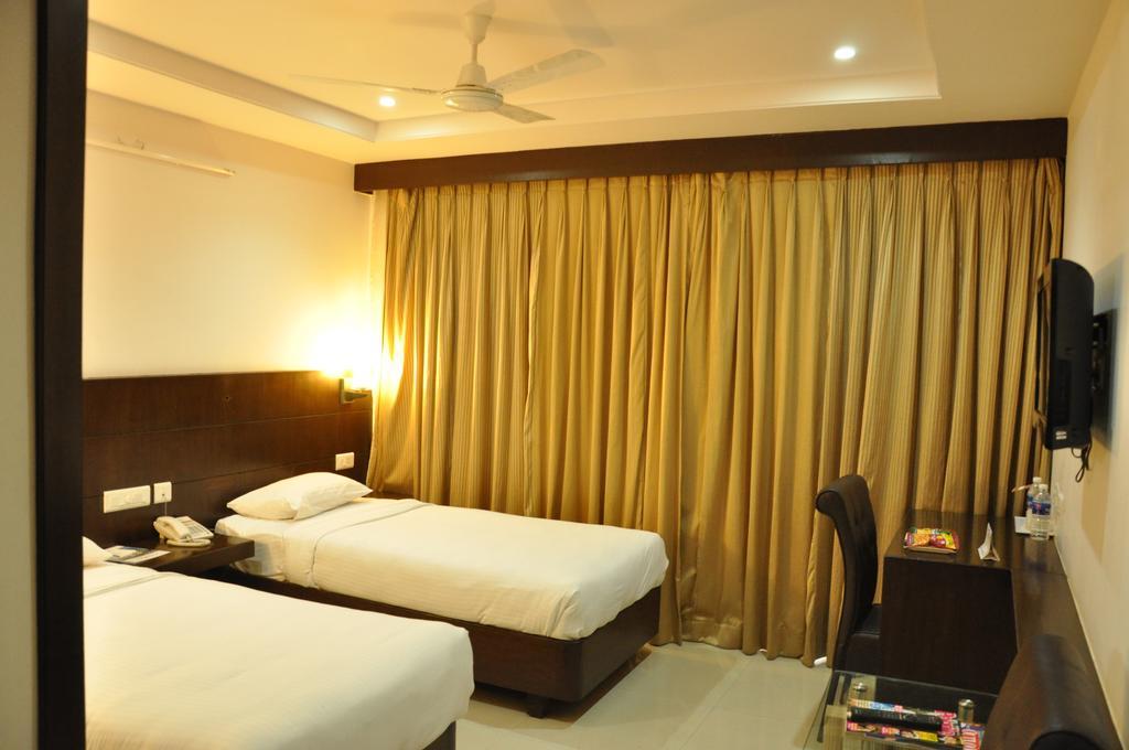 La Hospin Hotel Rajahmundry Room photo